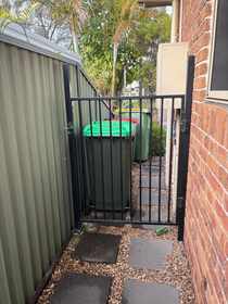 Stepping-stone side path installation at a residential property